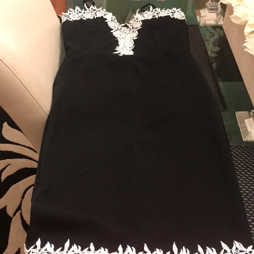 Black dress with white floral accent